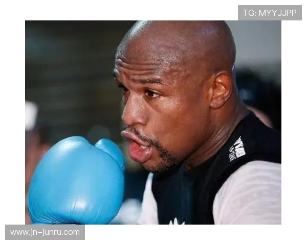 两代拳王对决泰森梅威瑟四月